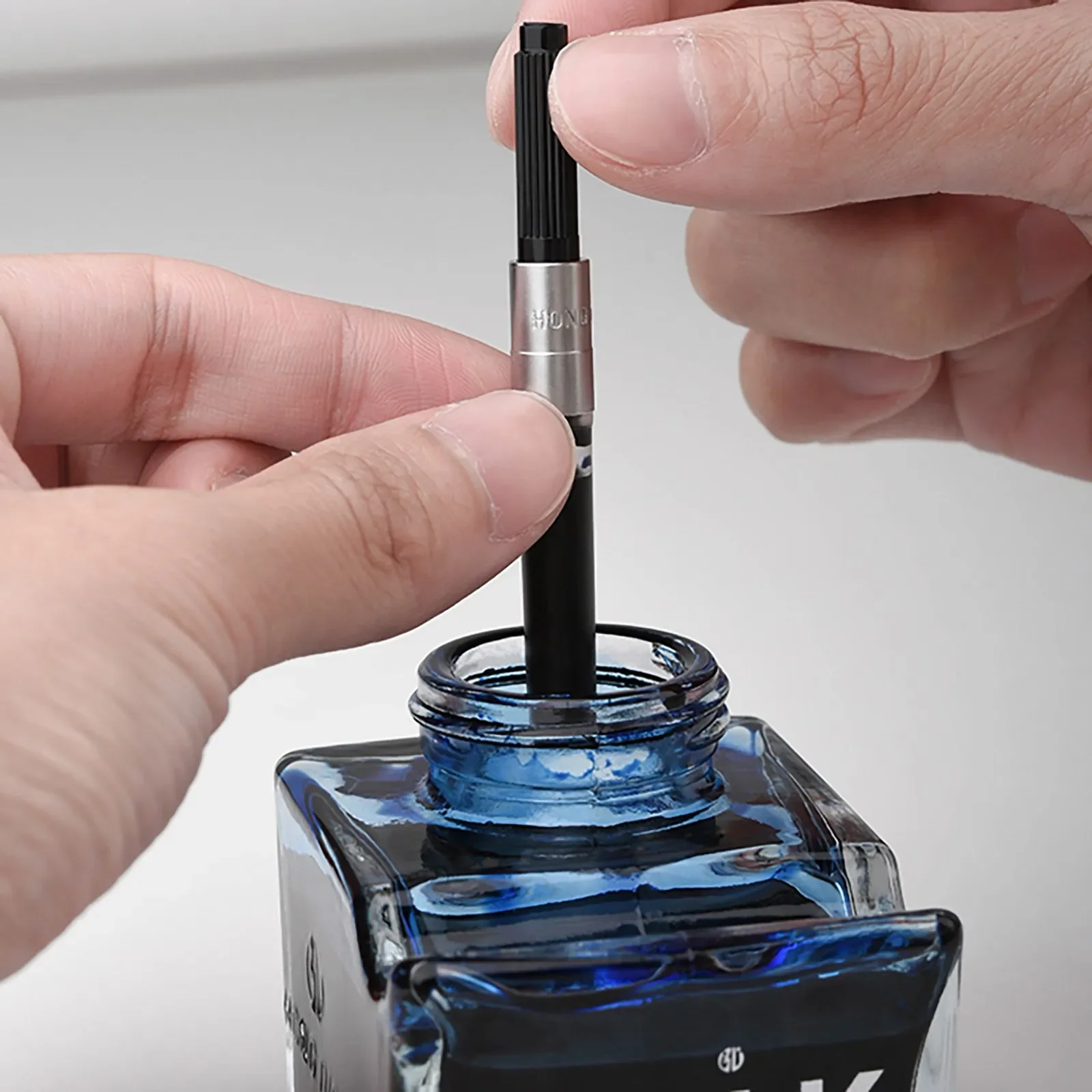 قطعتان من محول حبر دوار لامتصا - مراجعة Fountain Pen Bottled Ink وسعره